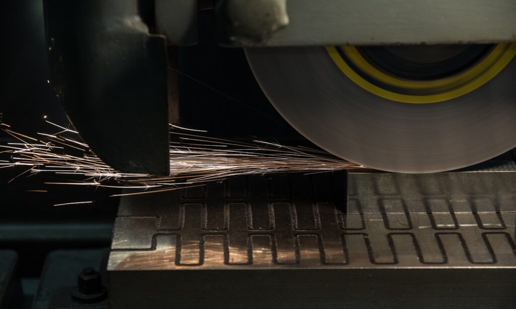 grinding machine, flying sparks, industry-3398503.jpg